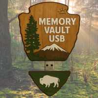 Memory Vault USB with nature-themed design in a forest setting